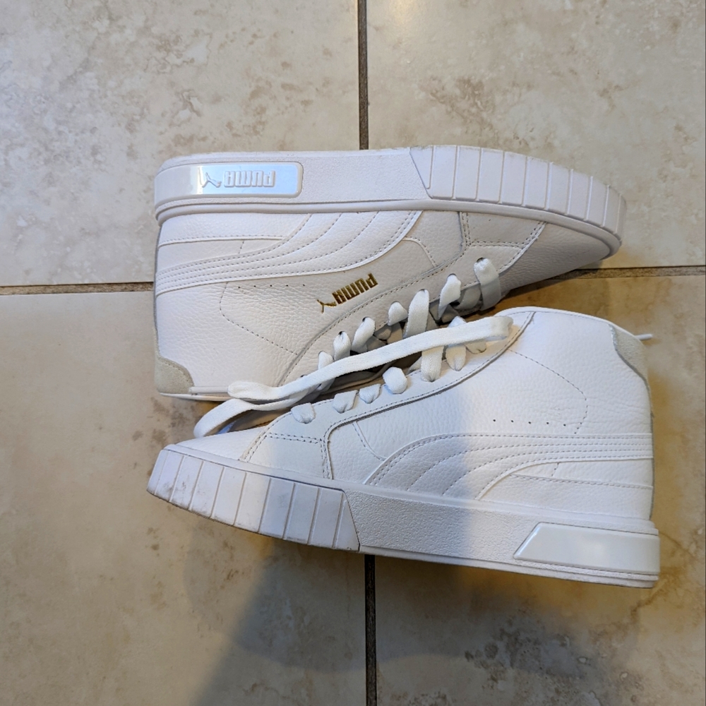 White Puma high-top sneakers